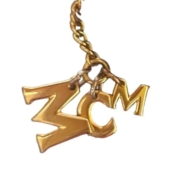 EUC MCM Wallet with charms still attached. Black Leather - Picture 10 of 13